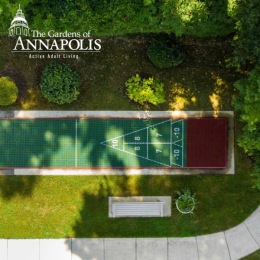 aerial view of a courtyard with a bench and sidewalk